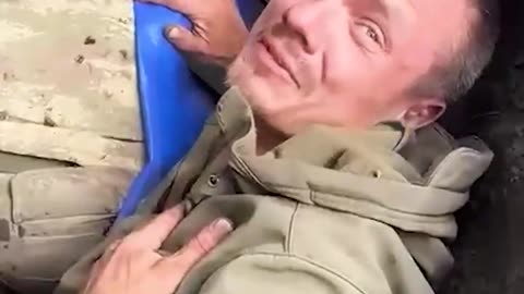 Ukraine War - Interrogation is conducted by a fighter from the militia of Zaporozhye.