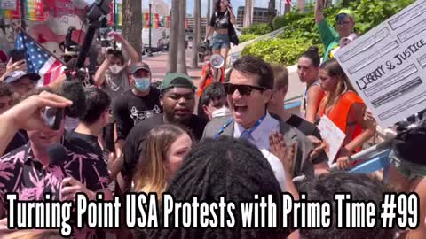 Alex Stein at TPUSA confronting protesters.