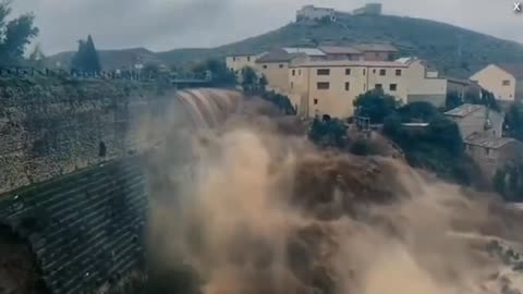 Shocking footage of dam in Spain holding back floodwater