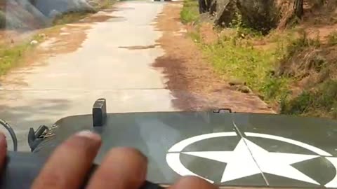 Driving a Willy Jeep on a Rocky Track