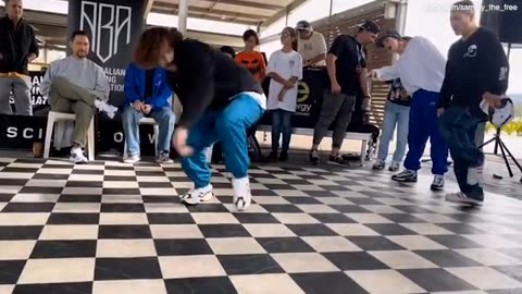 Raygun's coach and husband performs his own style of breakdancing