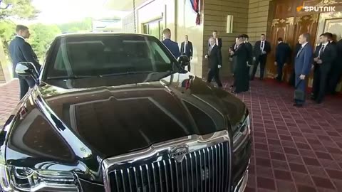 Putin DRiving Kim around in a FAke Rolls called Aura