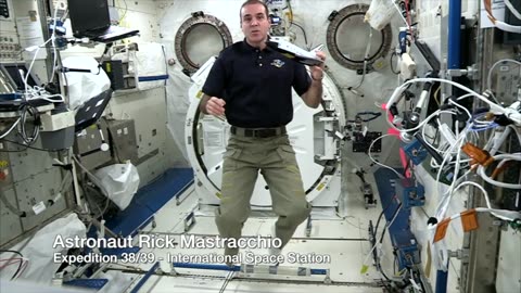 station astronauts do experiment for cosmos