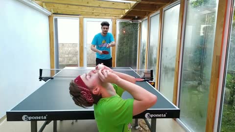 Guy Blows A Ping Pong Ball While His Friend Makes A Shot To Hit It - Awesome Trickshot