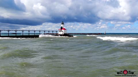 Drone Skims Waves Flying To Lighthouse In Heavy Winds 4K Drone Footage