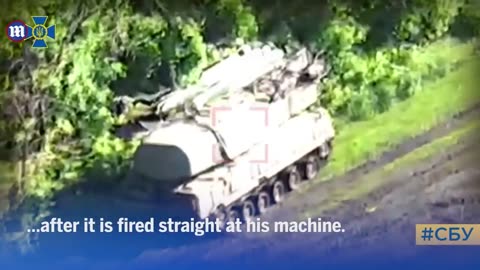 Incredible moment Ukraine drone dodges Russian missile before destroying armoured vehicle