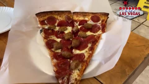 my trip to a big slice of sausage & pepperoni pizza