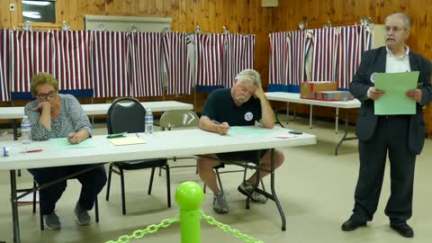 Danville town moderator Barry reading the final election results on Tuesday, July 13, 2021