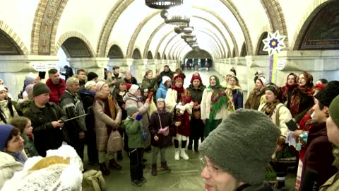 Kyiv residents sing Christmas carols in metro amid air raid alarm