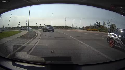 Older Couple Fails to Yield at a Roundabout