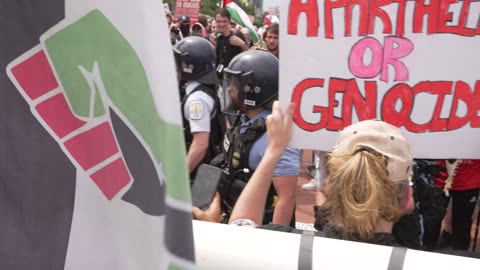 U.S. Park Police officer dragged away by a pro-Palestine protestor in Washington, D.C.