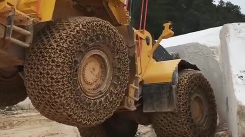 a rock or a truck who is stronger