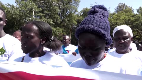 Activists condemn femicide on march to mourn Olympian Cheptegei