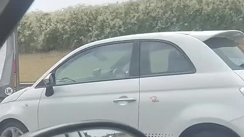 A car being towed on the motorway