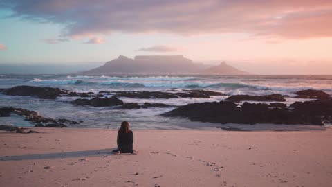 Watch now this moon while he is sitting on the sea watching the sunset