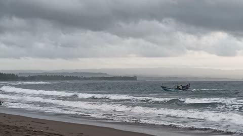 Fishing boat anchored on the beach