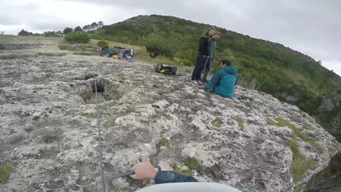 Men Traverse up Treacherous French Mountainside