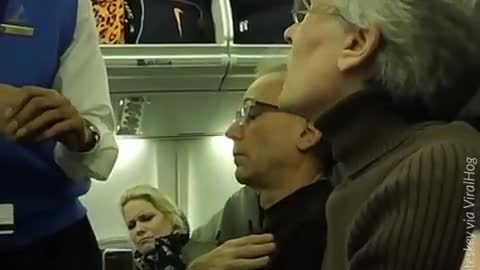 Liberal Woman Harassing a Trump Supporter, Gets Kicked off Plane By Police