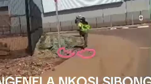 SA Police Officer chasing an elderly undocumented Zim woman