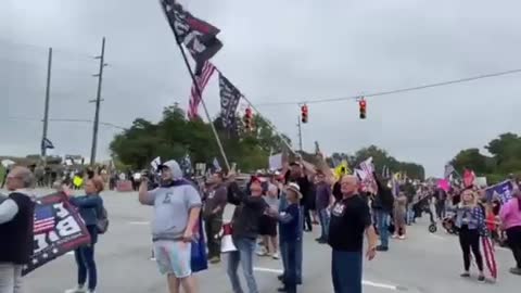 Biden greeted by 1000s of Trump Supporters in Howell MI