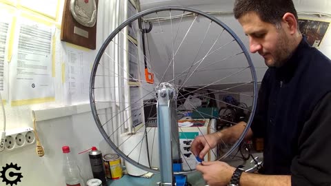 How to replace a rim on a bicycle wheel