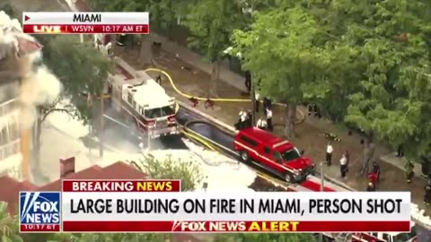 Large building on fire in Miami, person shot