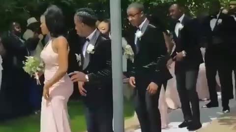 Wedding party delivers synchronized entrance dance