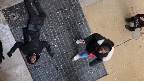 Busy daylight shooting at Madison and Wabash in Chicago captured on video.