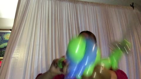 Gina The Balloon Girl makes a ninja turtle balloon animal