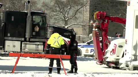 Ottawa police tow trucks from protest area