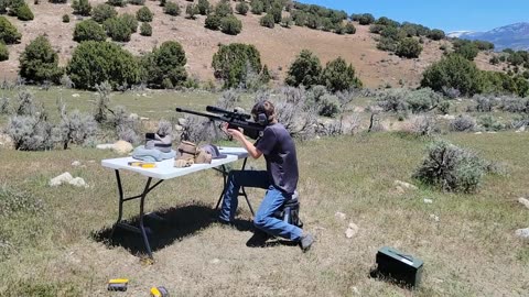 Boy with a 50 cal. Barretta.