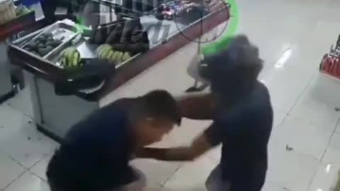 Entire store staff beats down a robber