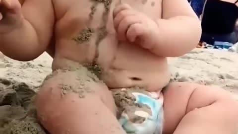 Baby reaction in beach