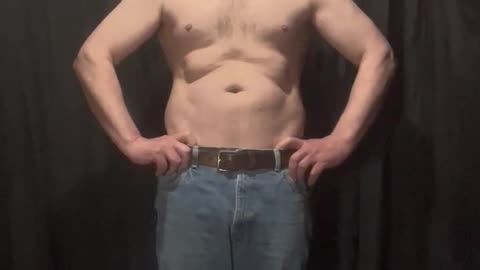 Fat man flexes his flab 14 of 14