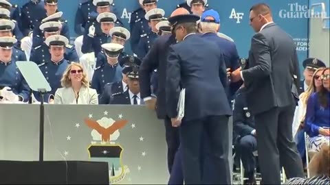 Joe Biden falls on stage at US air force academy ceremony