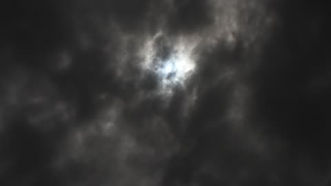 moon behind clouds