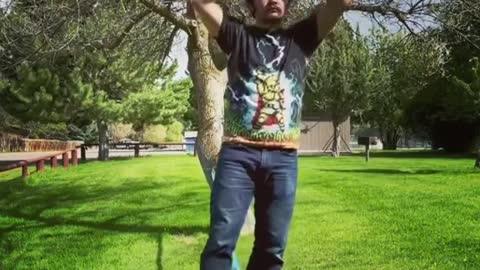 Man Kicks Bowl Into Another Bowl on His Head While Slacklining