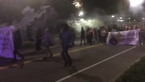 Sep 18 2017 Georgia Tech 1.1 Antifa shoot fireworks ahead of them clearing the streets