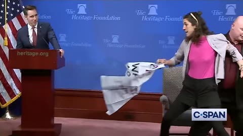 Insane Leftist Activist Rushes Stage - Gets Laughed Out of Room