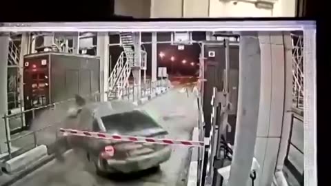 car spins out of control through toll gates