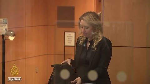 Elizabeth Holmes sentenced to more than 11 years in prison