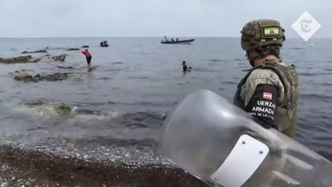 Ceuta: Migrant boy swims to shore with plastic bottles tied to himself