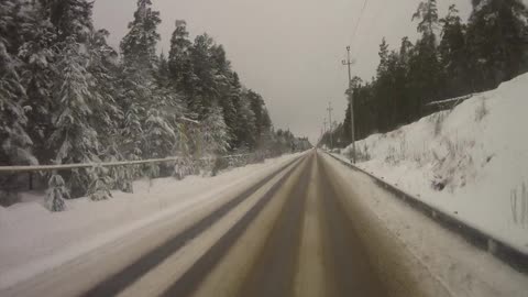 Overtaking Car Slides Into Oncoming Traffic Head-On