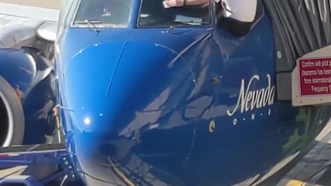 Airline Pilots Manually Wipe Windshield before Flight