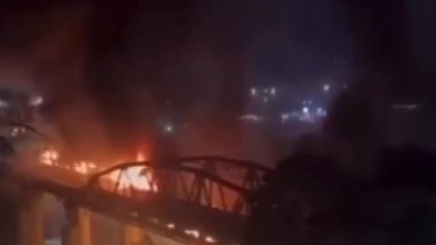 The moment when Rome’s “Ponte di Ferro” or “iron bridge” broke apart in flames