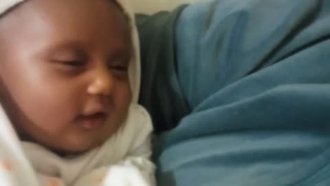 Cute baby Laughing in her dreams