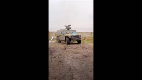 Russian APC Tigr-M Painted With Ukrainian Flag