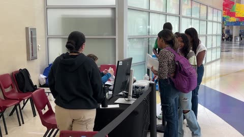 An illegal alien family unit is spotted at the departure terminal at SA Airport