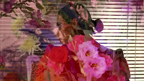 Abstract female video with an LGBTQ boy and flowers