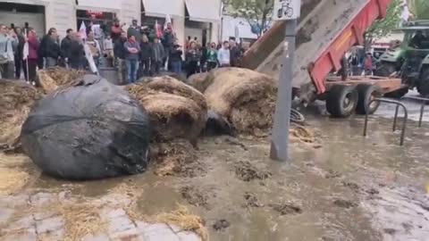 France. Farmers dumped several trailers of manure, tires and waste in front of the Prefecture of Pau